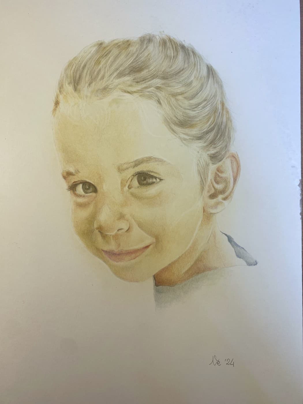Colored pencil portrait of a smiling young girl with her hair in a bun.
